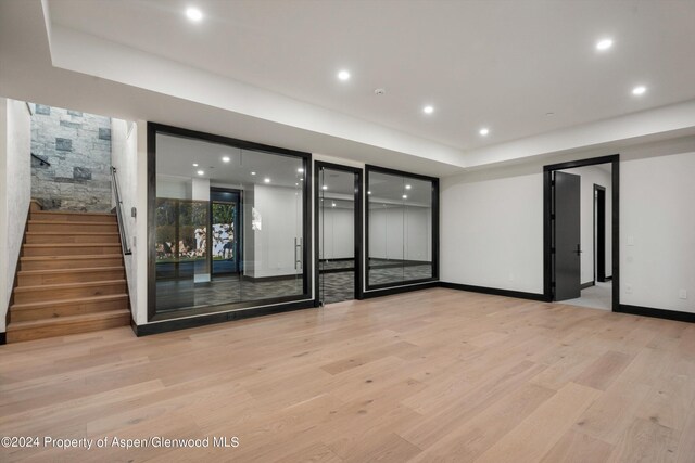 unfurnished room featuring light hardwood / wood-style floors