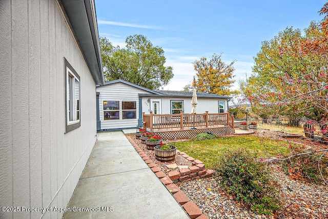 view of yard featuring a deck