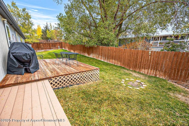 view of yard featuring a deck