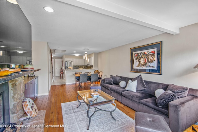 115 Harleston Grn Unit 63, Snowmass Village, CO 81615 - living area with hardwood / wood-style floors and recessed lighting