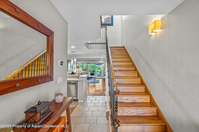 115 Harleston Grn Unit 63, Snowmass Village, CO 81615 - staircase with tile patterned flooring and recessed lighting