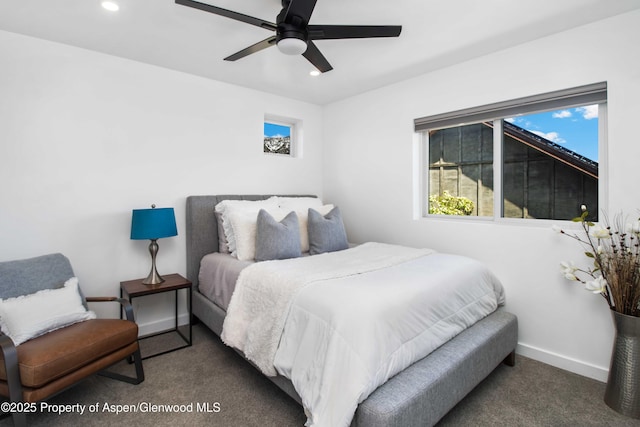 carpeted bedroom with multiple windows, recessed lighting, baseboards, and ceiling fan