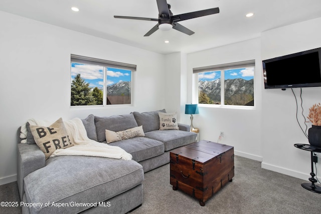 living room with recessed lighting, baseboards, ceiling fan, and carpet flooring