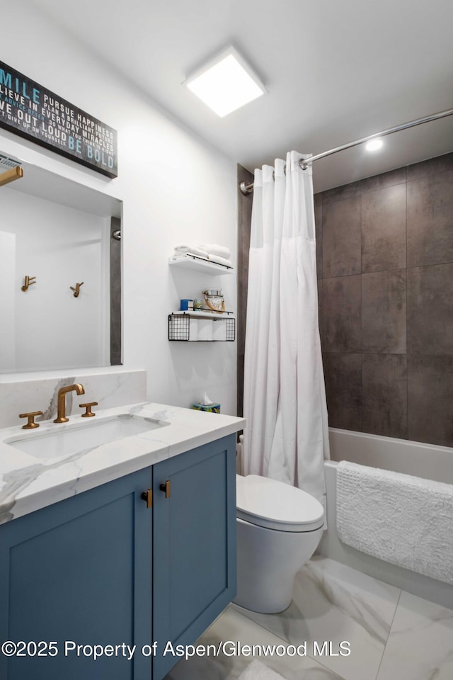 full bathroom with toilet, vanity, and shower / bath combo with shower curtain