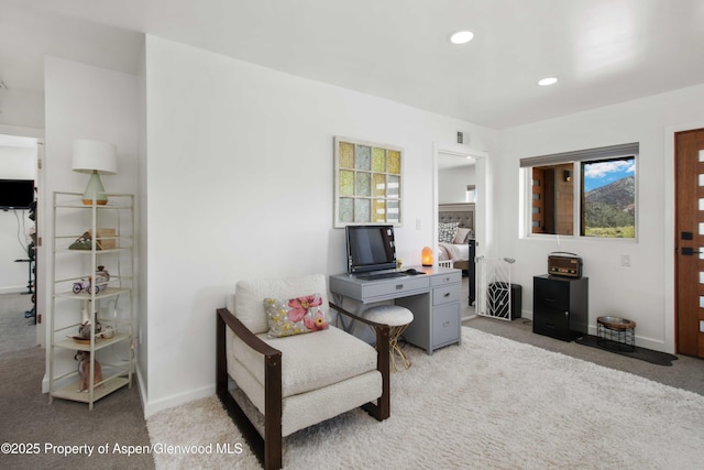 carpeted office with recessed lighting and baseboards