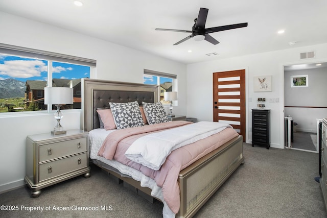 carpeted bedroom featuring recessed lighting, ceiling fan, and baseboards