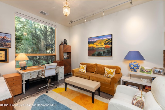 102 Evans Rd Unit 104, Basalt, CO 81621 - living area with rail lighting, a desk, and wood finished floors