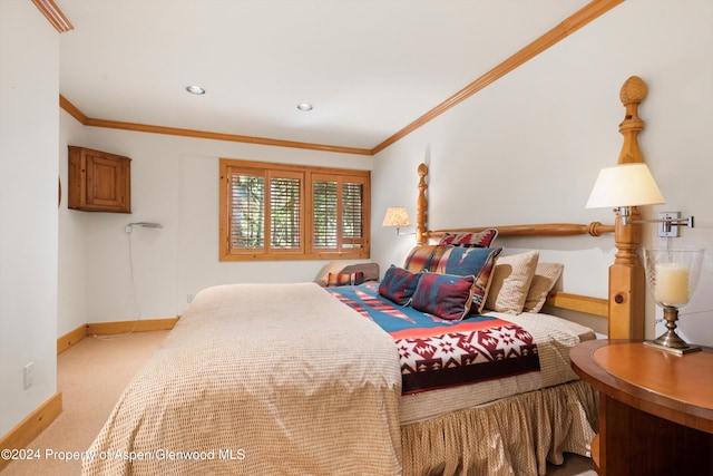 carpeted bedroom with crown molding