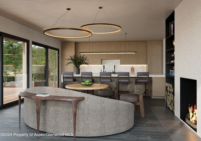 interior space with dark hardwood / wood-style flooring and a notable chandelier