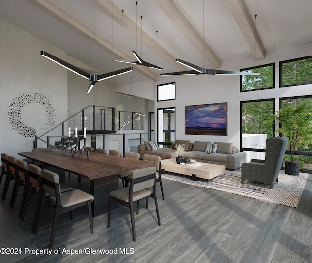 dining room with wood-type flooring, high vaulted ceiling, ceiling fan, and beam ceiling