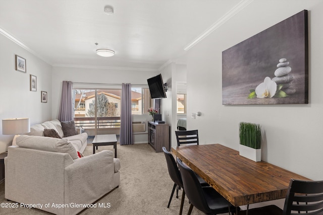 living room with crown molding and light colored carpet