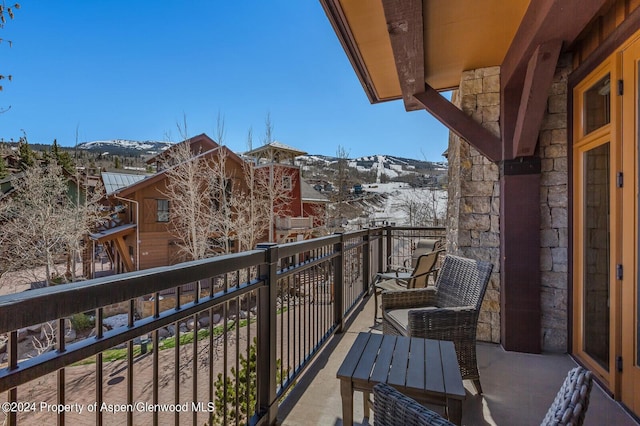 balcony featuring a mountain view