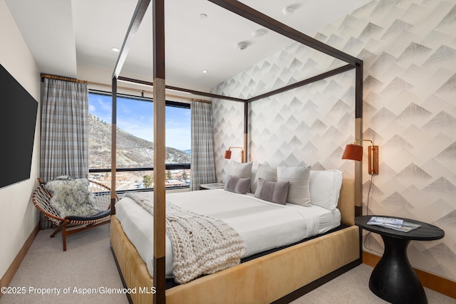 bedroom with recessed lighting, baseboards, carpet floors, and wallpapered walls