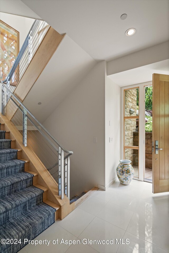 250 Mountain Laurel Dr Unit B, Aspen, CO 81611 - stairway featuring recessed lighting, tile patterned flooring, and baseboards