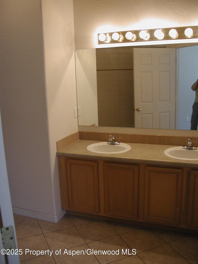 2701 Midland Ave Unit 0511, Glenwood Springs, CO 81601 - full bath with a sink, tile patterned floors, and double vanity