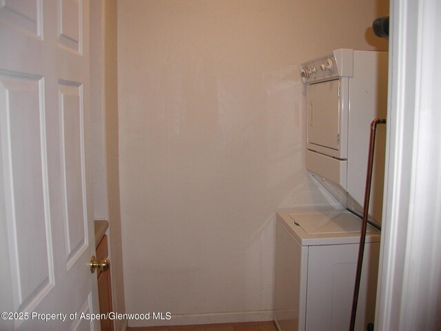 2701 Midland Ave Unit 0511, Glenwood Springs, CO 81601 - clothes washing area with laundry area and stacked washing maching and dryer