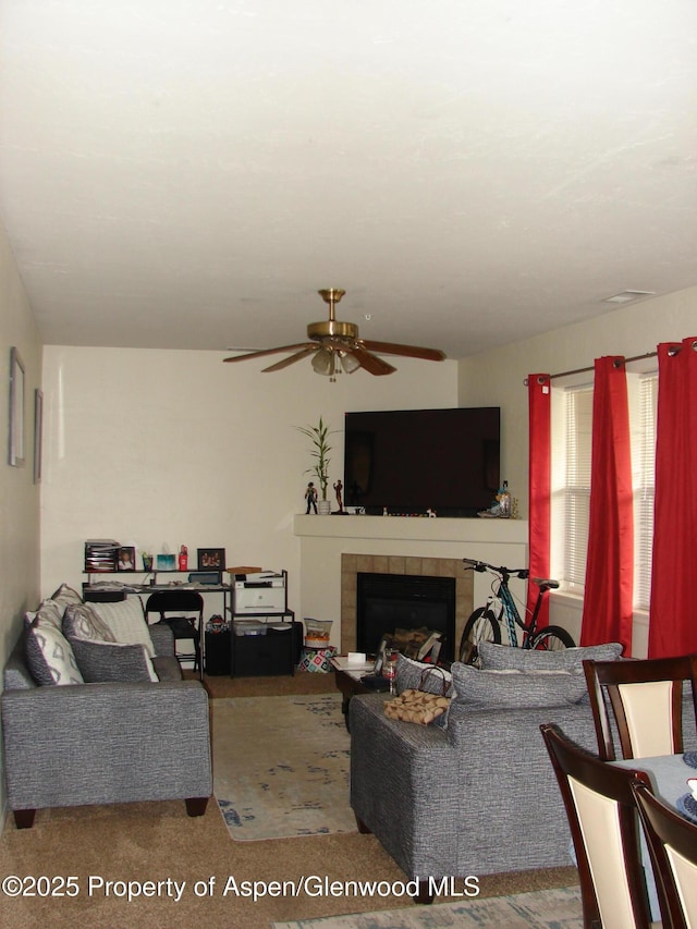 2701 Midland Ave Unit 0511, Glenwood Springs, CO 81601 - living room featuring carpet flooring, ceiling fan, and a fireplace