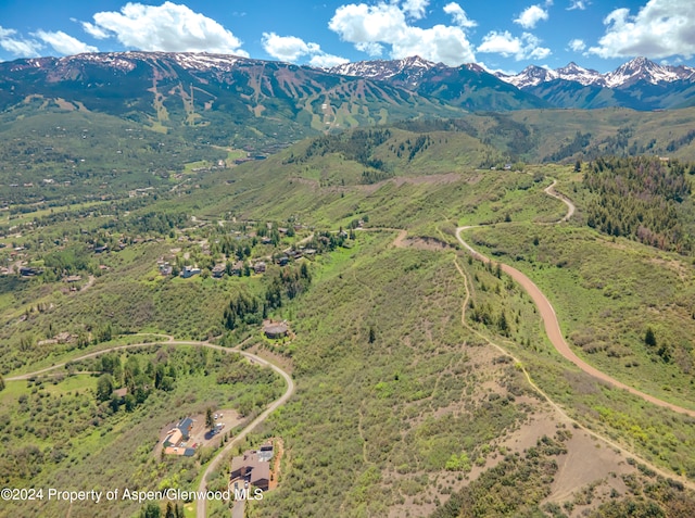 bird's eye view with a mountain view