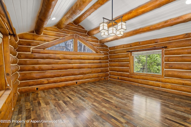 1116 Walz Ave, Glenwood Springs, CO 81601 - spare room with hardwood / wood-style flooring and log walls