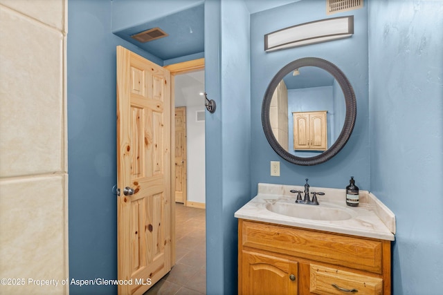 1116 Walz Ave, Glenwood Springs, CO 81601 - bathroom with vanity and tile patterned flooring