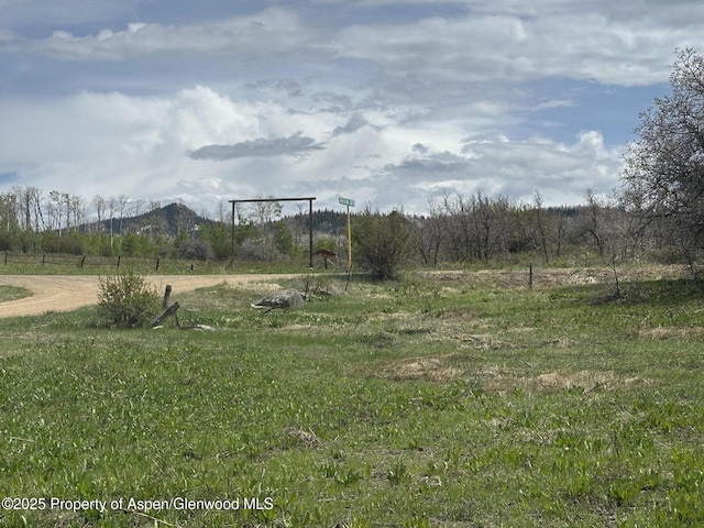 2025 Timberlane Dr, Craig, CO 81625 - view of yard featuring a view of rural / pastoral area and a mountain view