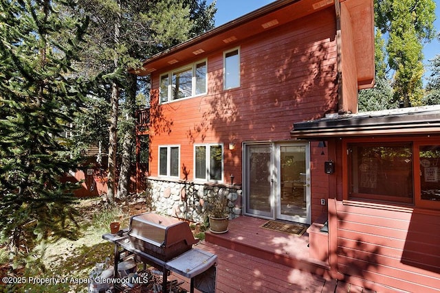 311 Midland Ave, Aspen, CO 81611 - back of property with a wooden deck and stone siding