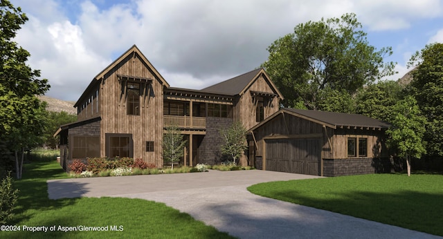 view of front of property with a front lawn and a garage