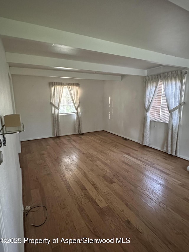 890 Breeze St, Craig, CO 81625 - unfurnished living room with wood-type flooring