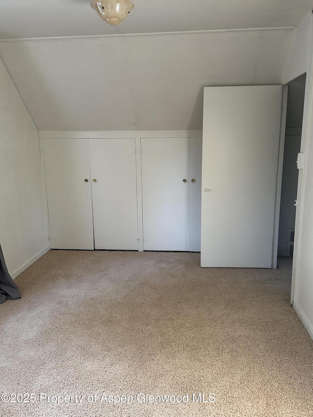 890 Breeze St, Craig, CO 81625 - additional living space with lofted ceiling and carpet floors