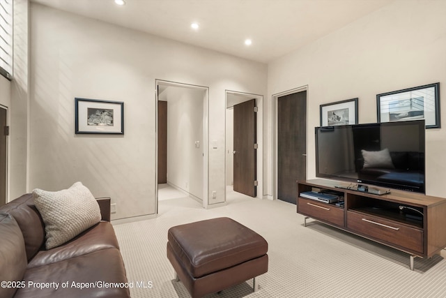 939 E Cooper Ave, Aspen, CO 81611 - carpeted living room with recessed lighting and baseboards