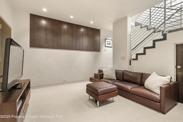 939 E Cooper Ave, Aspen, CO 81611 - carpeted living area with stairway and recessed lighting