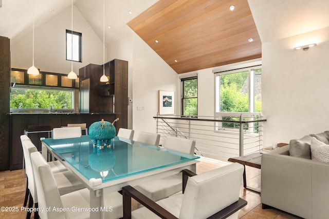 939 E Cooper Ave, Aspen, CO 81611 - dining area with high vaulted ceiling, healthy amount of natural light, recessed lighting, and wood ceiling