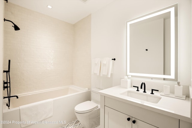 full bathroom featuring vanity, toilet, and tiled shower / bath combo