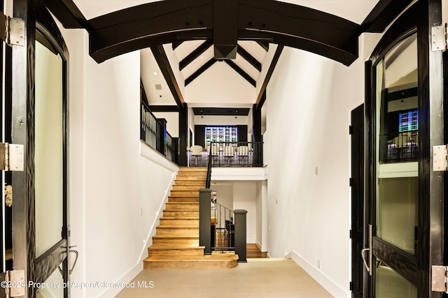 stairway with a high ceiling