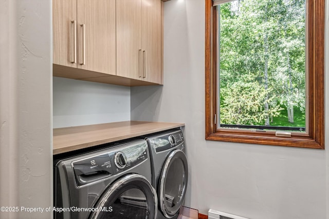 477 Aspen Oak Dr, Aspen, CO 81611 - washroom featuring cabinet space and washer and clothes dryer
