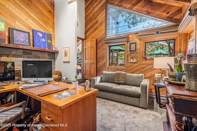 477 Aspen Oak Dr, Aspen, CO 81611 - carpeted home office with high vaulted ceiling, wood walls, and wooden ceiling