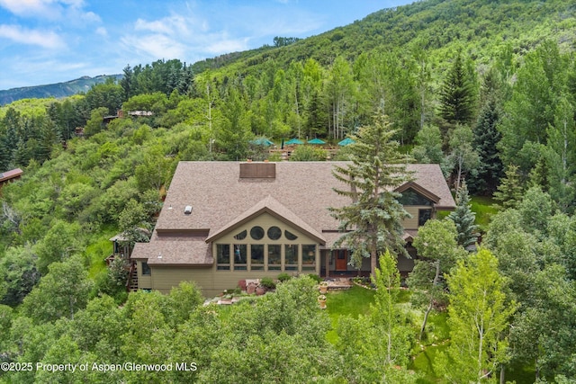 477 Aspen Oak Dr, Aspen, CO 81611 - view from above of property with a heavily wooded area and mountains
