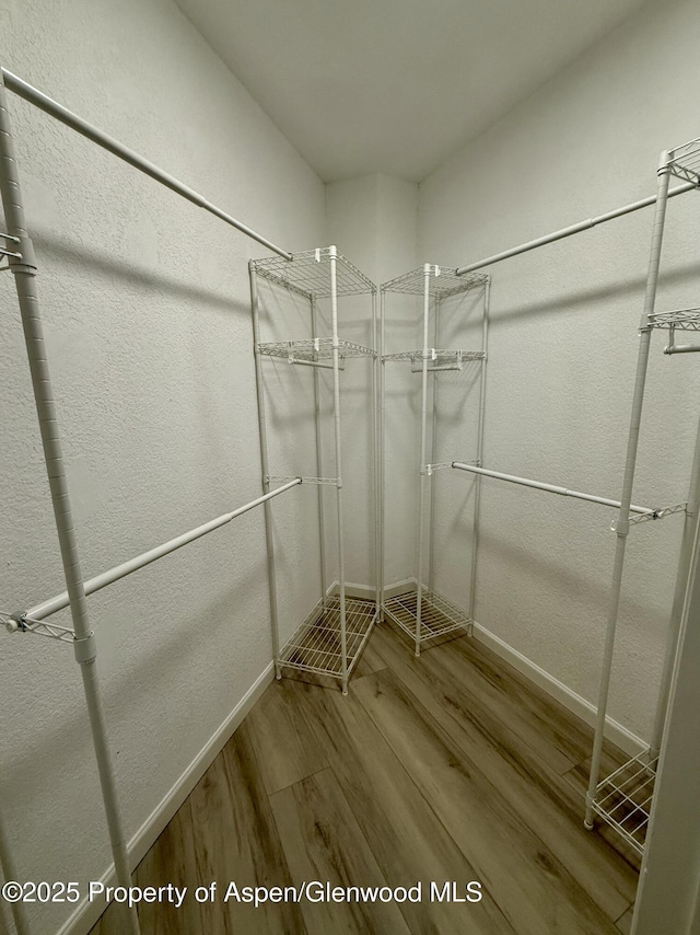 3102 Elk Ln, Basalt, CO 81621 - walk in closet featuring wood finished floors
