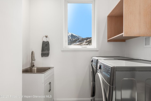 787 Serpentine Trl, Marble, CO 81623 - washroom with independent washer and dryer, healthy amount of natural light, and cabinet space