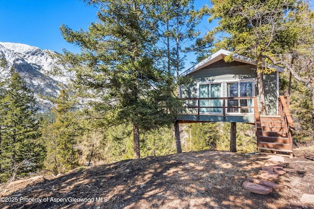 787 Serpentine Trl, Marble, CO 81623 - rear view of house featuring a deck with mountain view