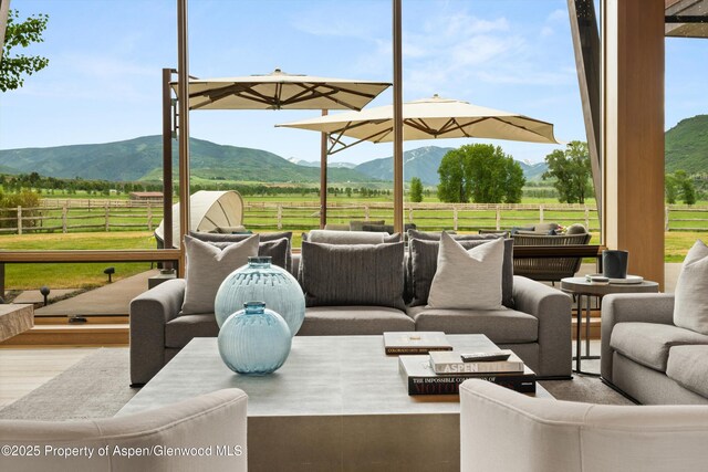 425 Aspen Valley Ranch Rd, Woody Creek, CO 81656 - view of patio / terrace featuring an outdoor hangout area, a view of rural / pastoral area, and a mountain view