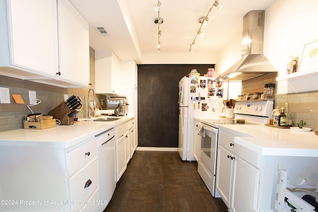 kitchen with white cabinets, white appliances, and extractor fan