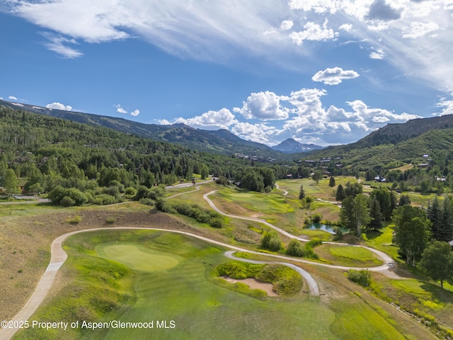 52 Harleston Grn Unit 38, Snowmass Village, CO 81615 - aerial view of a water and mountain view and a golf course