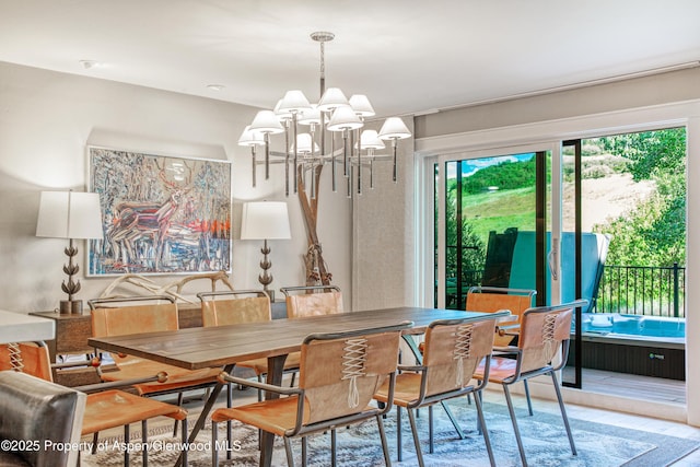 52 Harleston Grn Unit 38, Snowmass Village, CO 81615 - dining area with a chandelier and wood finished floors