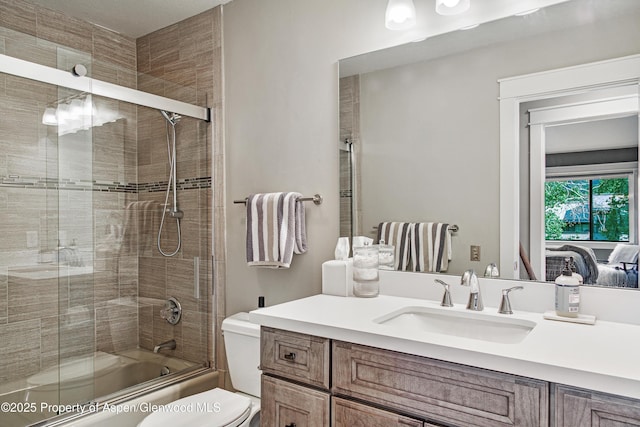 52 Harleston Grn Unit 38, Snowmass Village, CO 81615 - ensuite bathroom featuring vanity and combined bath / shower with glass door