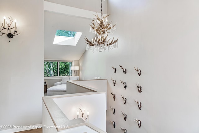 52 Harleston Grn Unit 38, Snowmass Village, CO 81615 - stairs with a skylight and a chandelier