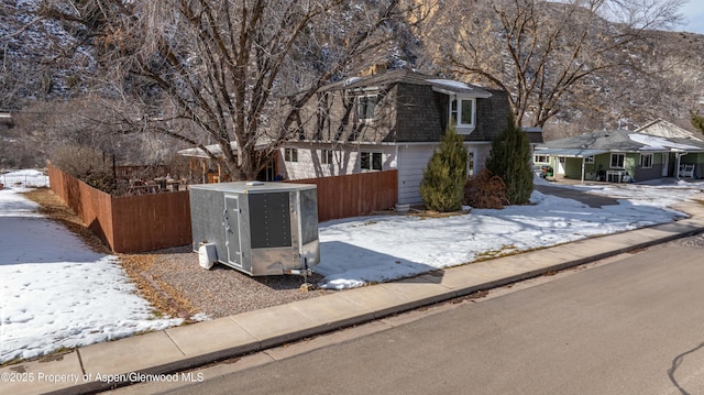 view of property with a storage unit