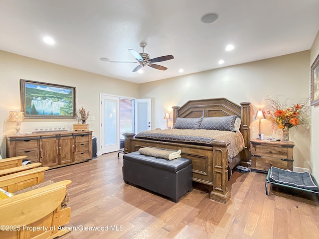 bedroom featuring light wood finished floors, recessed lighting, and a ceiling fan