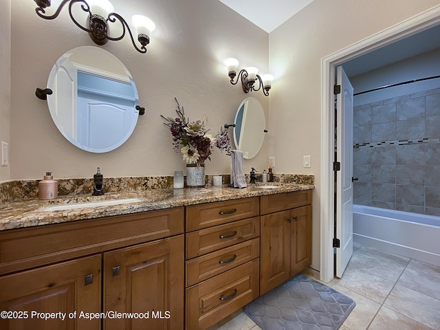 full bath featuring double vanity, tile patterned flooring, and shower / tub combination