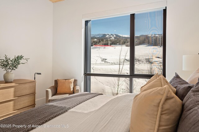 bedroom with a mountain view